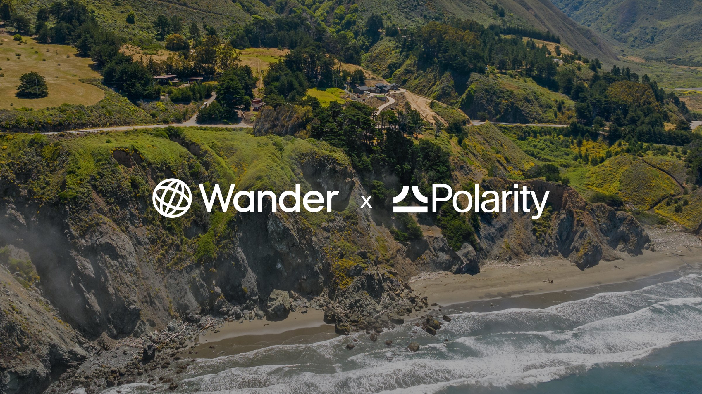 The Wander and Polarity logos over an aerial view of a coastal hillside